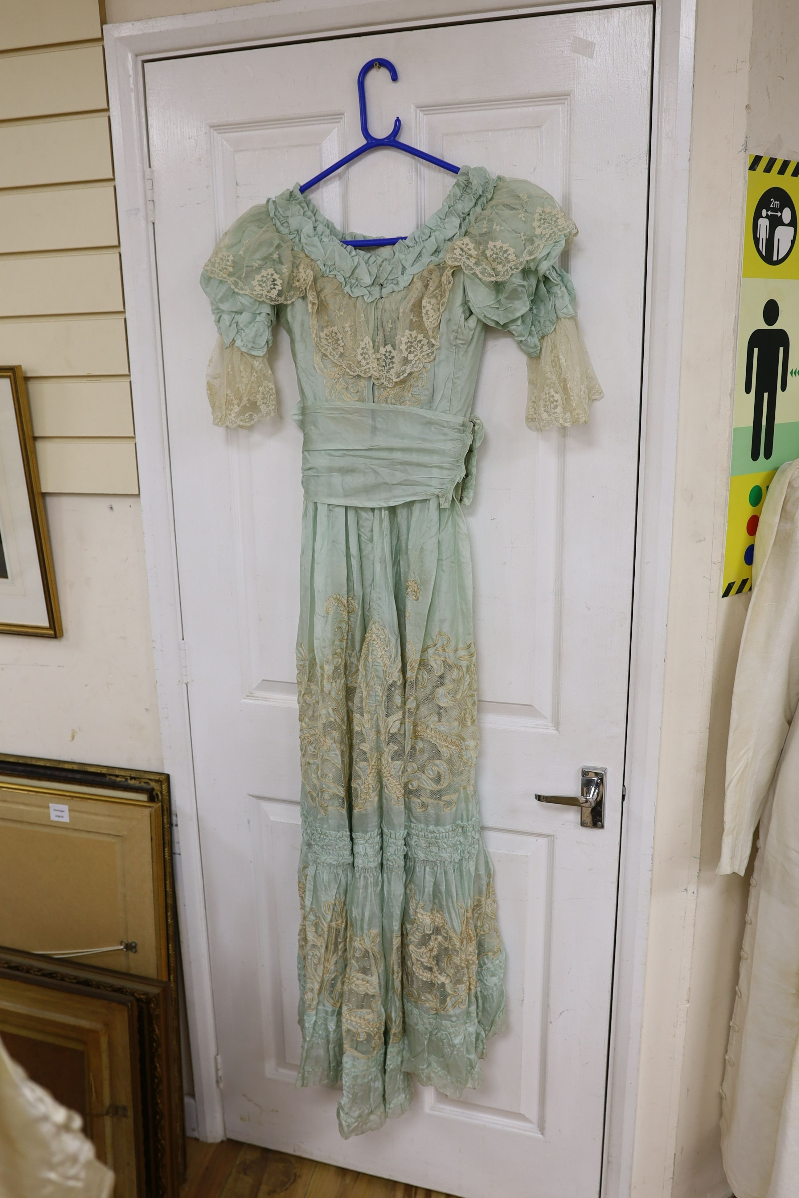 An Edwardian fine turquoise silk and ecru embroidered and lace ladies dress
